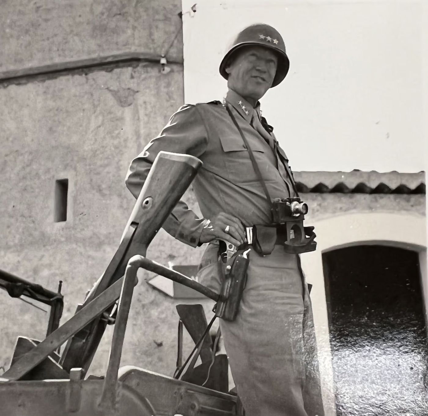 With a camera on a fort wall.