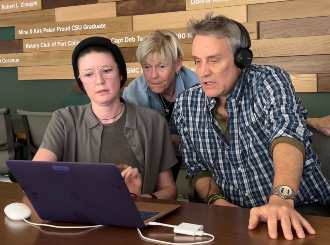 Veterans editing their film together at a workshop